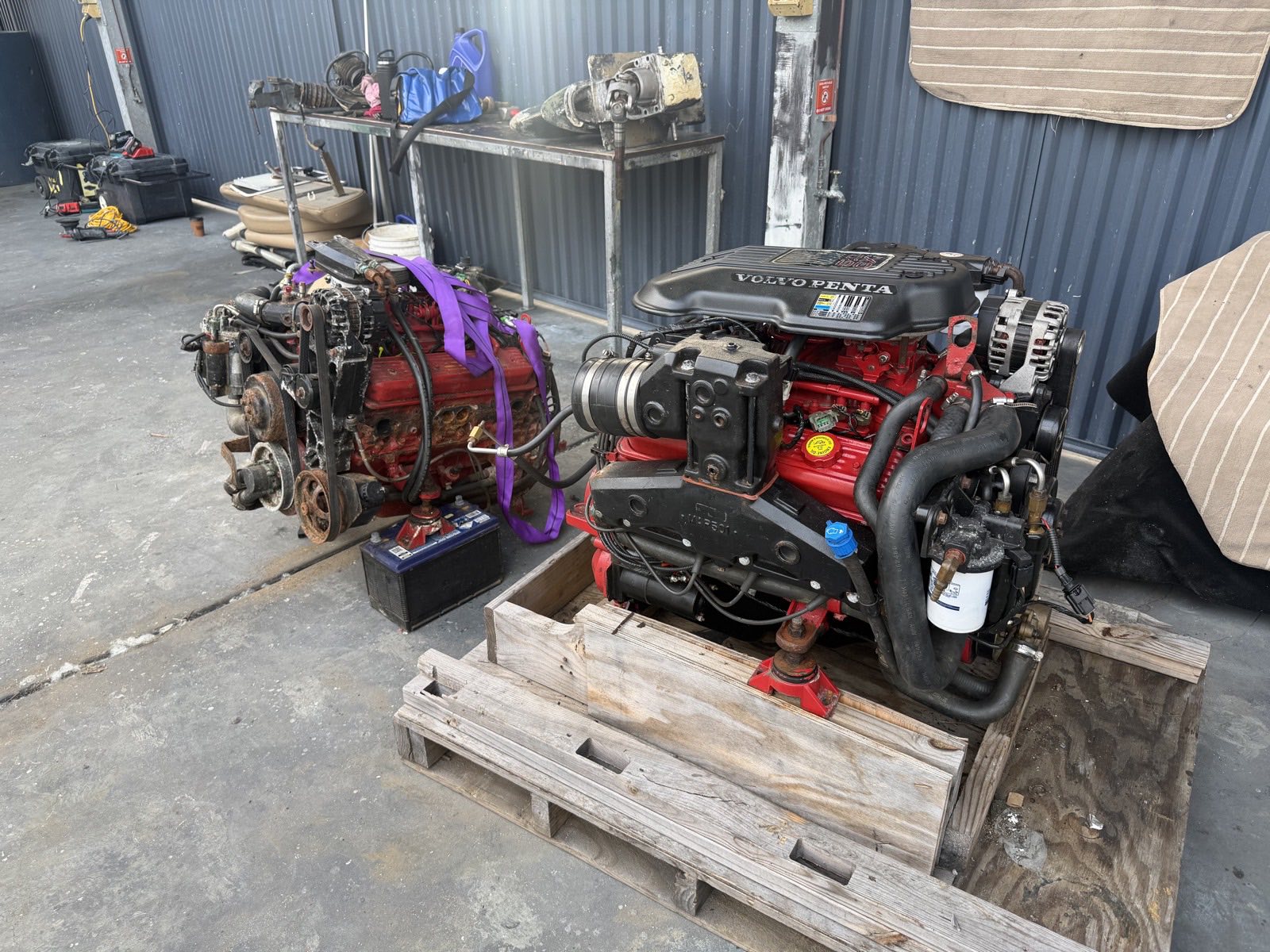 Petrol marine engine removed and on the hardstand