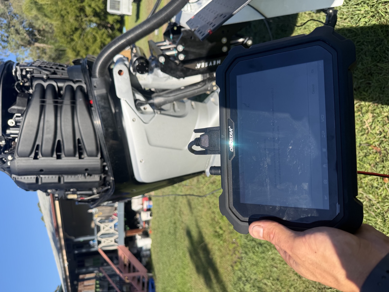 Diagnostic tablet connected to a Mercury Verado 300 outboard