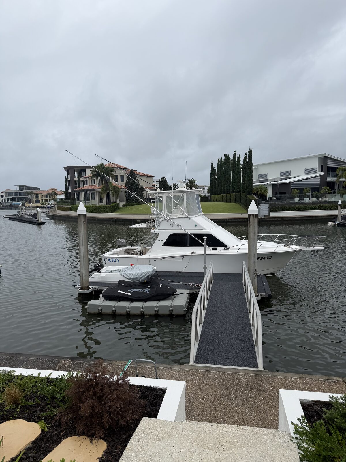 Flybridge cruiser at Gold Coast marina