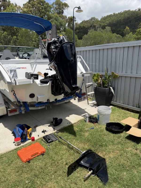 Outboard engine being serviced